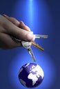 Womans Hand Holding Keys To The World Royalty Free Stock Photo