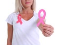 Womans hand holding pink breast cancer awareness ribbon Royalty Free Stock Photo