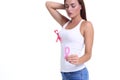 Womans hand holding pink breast cancer awareness ribbon Royalty Free Stock Photo