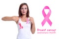 Womans hand holding pink breast cancer awareness ribbon Royalty Free Stock Photo