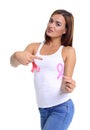 Womans hand holding pink breast cancer awareness ribbon Royalty Free Stock Photo