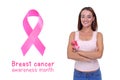 Womans hand holding pink breast cancer awareness ribbon Royalty Free Stock Photo