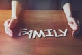 Womans hands with Family word