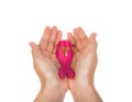 Womans hands holding pink breast cancer awareness ribbon isolate Royalty Free Stock Photo