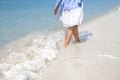 Womans legs foot at beach in summer Royalty Free Stock Photo