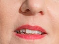 Womans mouth with red lipstick