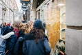 Women admiring the showcase window of a shoe store