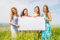 Women with advertising board Royalty Free Stock Photo