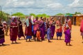 women from the African tribe Maasai in national dress in their village houses made of clay Royalty Free Stock Photo