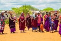 women from the African tribe Maasai in national dress in their village houses made of clay Royalty Free Stock Photo