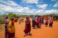 women from the African tribe Maasai in national dress in their village houses made of clay Royalty Free Stock Photo