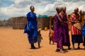 women from the African tribe Maasai in national dress in their village houses made of clay Royalty Free Stock Photo