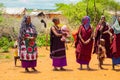 women from the African tribe Maasai in national dress in their village houses made of clay Royalty Free Stock Photo