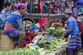 Women on an Asian food market