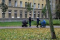 Women with baby carriages in the park.