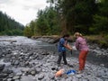 Women Backpackers Filtering Water