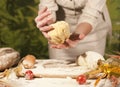 Women baker hands mixing, kneading preparation dough and making bread Royalty Free Stock Photo