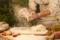 Women baker hands mixing,recipe kneading butter, tomato preparation dough and making bread Royalty Free Stock Photo