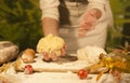 Women baker hands recipe flour kneading butter, tomato preparation dough and making bread Royalty Free Stock Photo