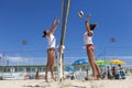 Women beach volleyball players. Attack and defense