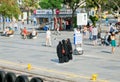 Women in black Islamic dress making group photo