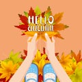 Women blue shoes on autumn leaves. Hands holding autumn leaves. Lettering Hello Autumn. Poster, banner vector