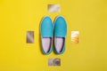 Women blue slip on shoes surrounded by cards