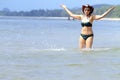 Woman body and bikini play wave on beach