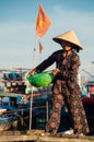 Women bringing in the fishing catch near Hoi An, Vietnam