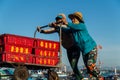 Women bringing in the fishing catch near Hoi An, Vietnam