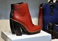 Women brown boots and leather bag