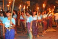 Women with burning torches at a procession,Bali, Indonesia