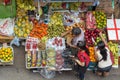 Women buying fruits from a stall in Hong Kong