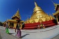 Women carring fruits on her head at Shwemawdaw Paya Pagoda.