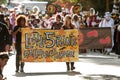 Women Carry Banner That Starts Halloween Parade