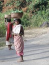 Women carry goods on their