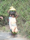 Women carry goods on their head