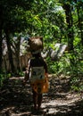 Women carrying fruits, on the way to Ampanihy Bay, approaching a village, Sainte Marie Island, Madagascar