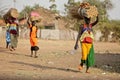 Women carrying loads, South Sudan