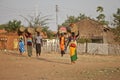 Women carrying loads, South Sudan