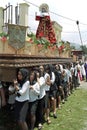 Women carrying shrine during Holy Week procession Royalty Free Stock Photo