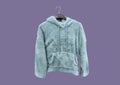 Women Casual Cozy Sherpa Fleece Pile Hoodie Pullover on a hanger