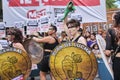 Women chanting feminist slogans while marching during the 8M women strike