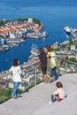 Women and a child looking at the view of Bergen in Norway