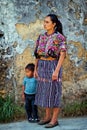 Women with child wearing traditional mayan clothes