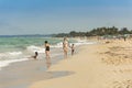 Women with children on beach Havana