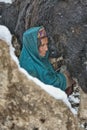 Women and children wake up in the morning to milk sheep, goats and yaks in very heavy snow conditions and very low temperatures at