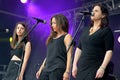 Women in the chorus of Skizophonic (band) performs at FIB Festival