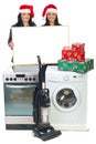 Women with Christmas offer at household appliances Royalty Free Stock Photo