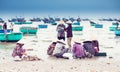 Women cleaning fish on the beach vietnam